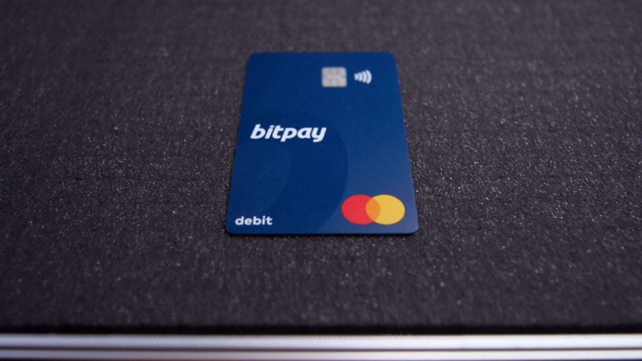 BitPay Prepaid Mastercard with USDT and USDC logos
